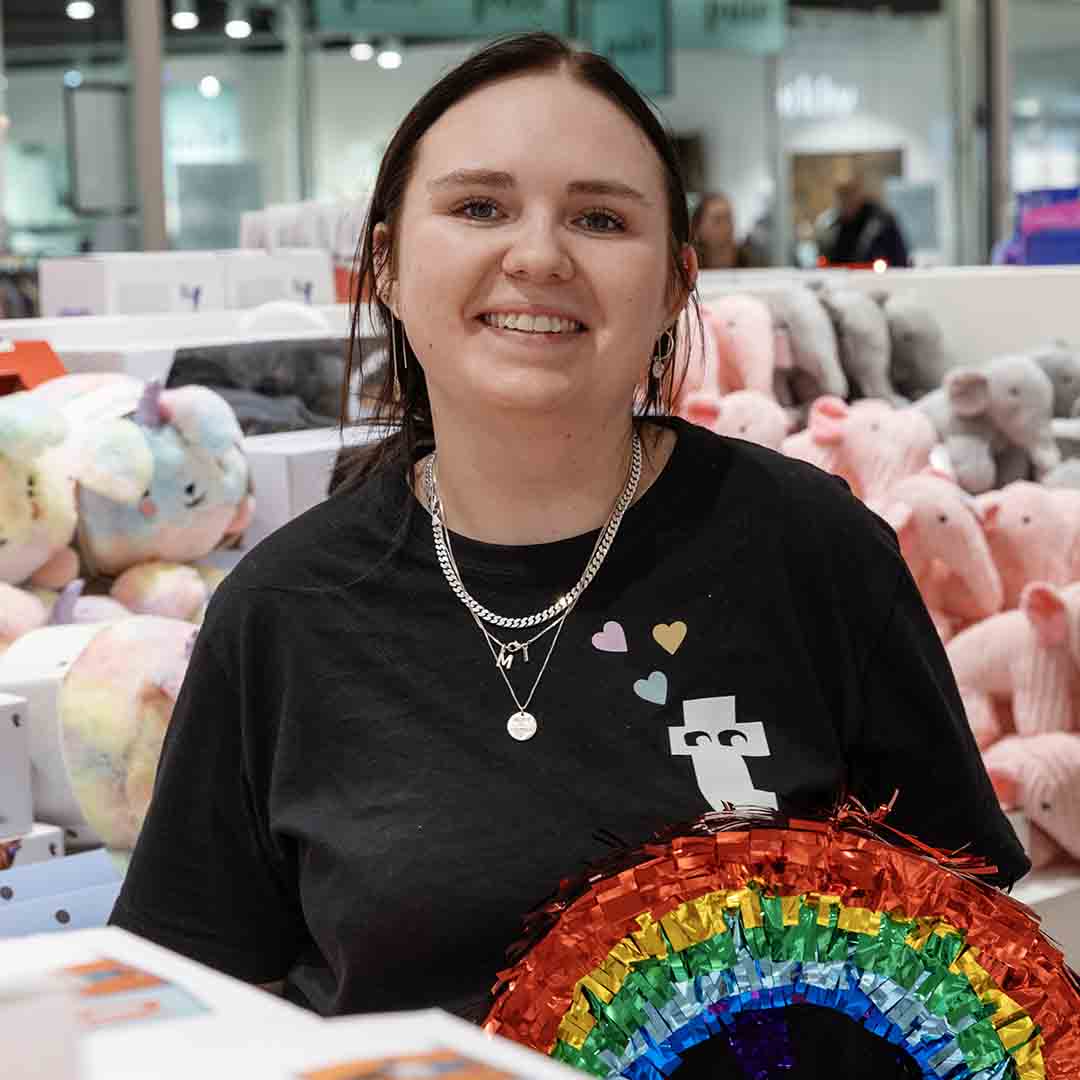 Smiling employee from Flying Tiger Copenhagen in Frederiksberg.